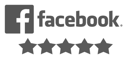 Professional house cleaner in uniform scrubbing bathtub with eco-friendly cleaning supplies.