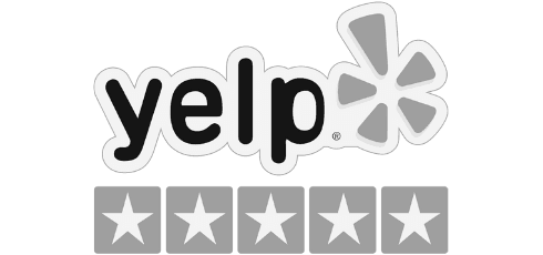 Professional cleaning service worker with mop and bucket cleaning hardwood floor.