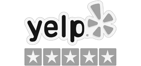 Professional cleaning service worker with mop and bucket cleaning hardwood floor.